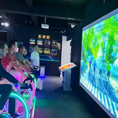 Buen precio Bicicleta de ejercicio con proyector de video juego de proyección interactivo simulador de ciclismo en línea