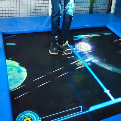 Buen precio Juegos de interior proyectados en el piso Proyector de trampolín para juegos de piso en línea