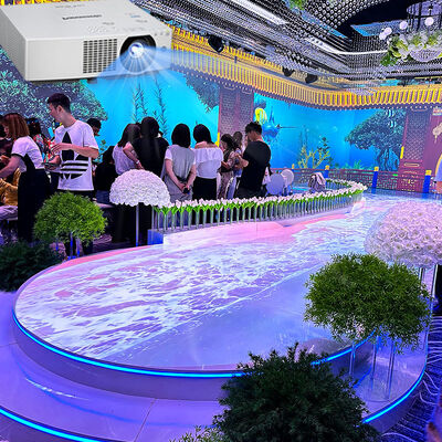 Buen precio Sistema de proyección interactivo con 5200 lumens Brillo 1920*1200 Resolución y 1-20 canales para proyección inmersiva en paredes y pisos en línea