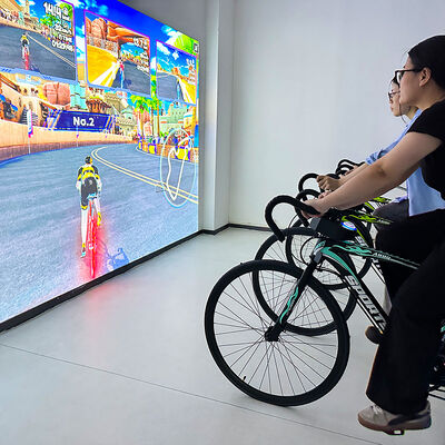 Buen precio Bicicleta de proyección interactiva con brillo de 3500 lumens y resolución de 1280*800 para centros de juegos y gimnasios con garantía de 1 año en línea